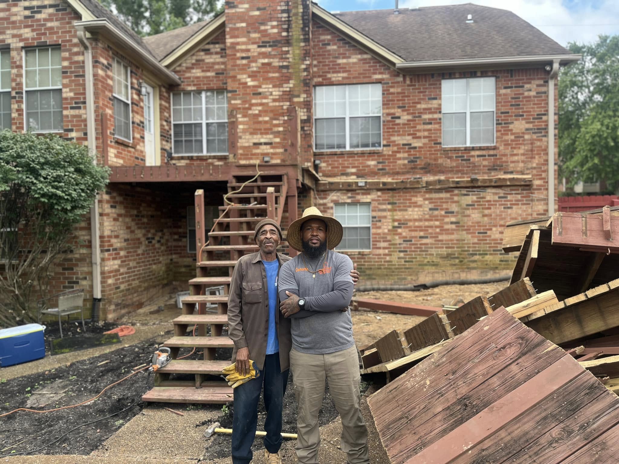 Monte Johnson and his grandfather on a remodeling job site